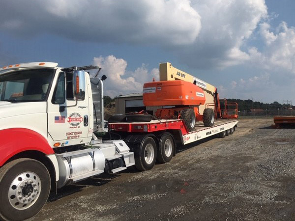 Truck transporting a crain